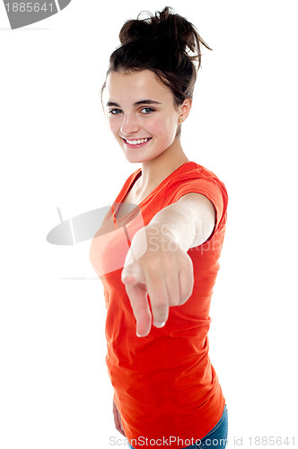 Image of Active pretty girl pointing at you