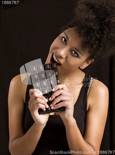 Image of Woman eating chcolate