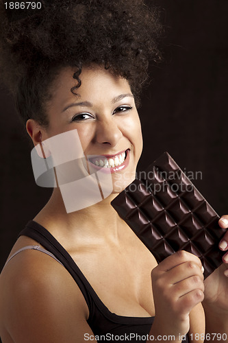 Image of Woman with a chocolate bar