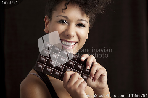 Image of Woman with a chocolate bar