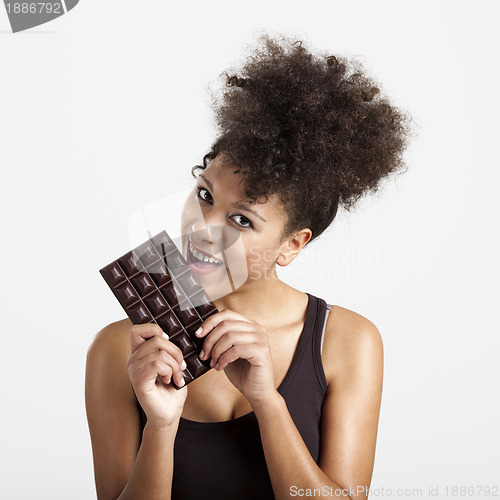 Image of Woman eating chcolate