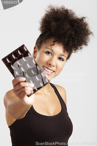 Image of Woman with a chocolate bar
