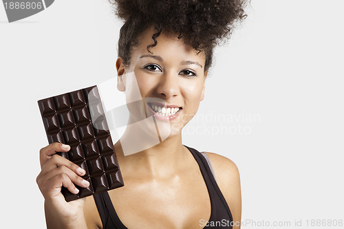 Image of Woman with a chocolate bar