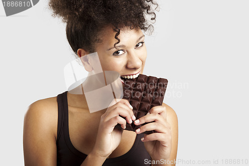 Image of Woman eating chcolate