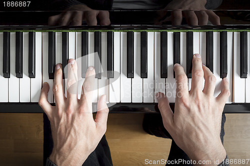 Image of piano playing
