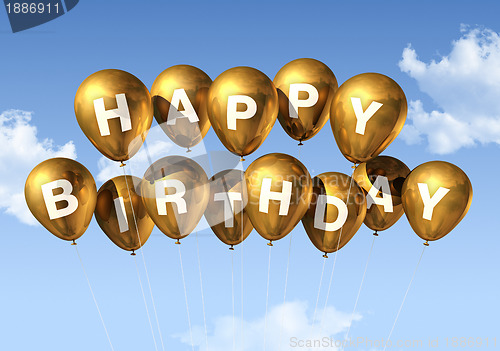 Image of Gold Happy Birthday balloons in the sky