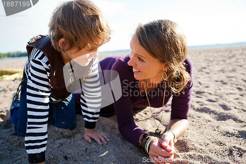 Image of Mother and son at beach.