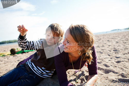 Image of Mother and son at beach.