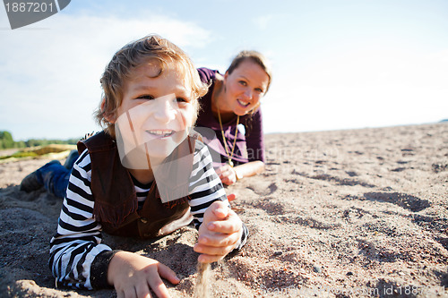 Image of Mother and son at beach.