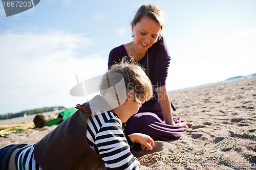 Image of Mother and son at beach.