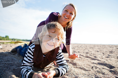 Image of Mother and son at beach.