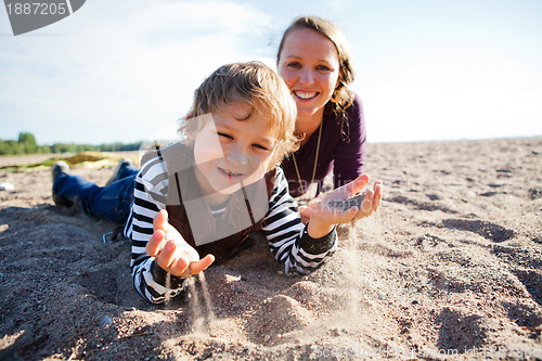 Image of Mother and son at beach.