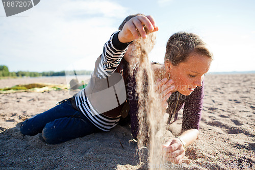 Image of Mother and son at beach.