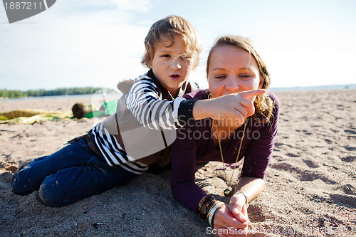 Image of Mother and son at beach.