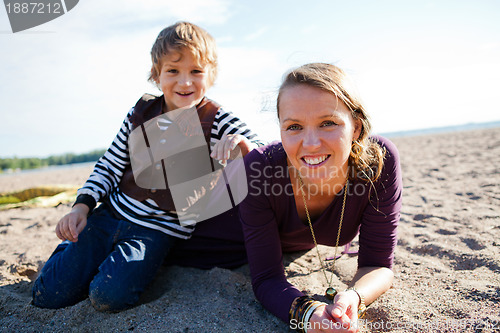 Image of Mother and son at beach.