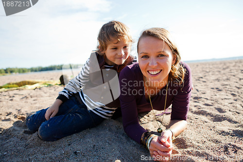 Image of Mother and son at beach.
