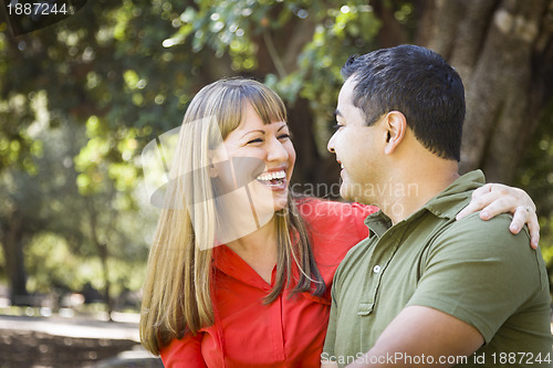 Image of Attractive Mixed Race Couple Enjoying A Day At The Park