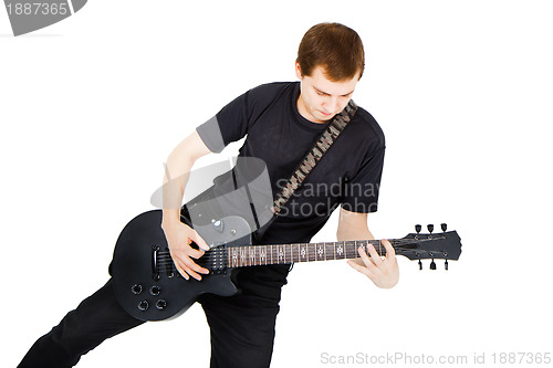 Image of Musician with a black electric guitar