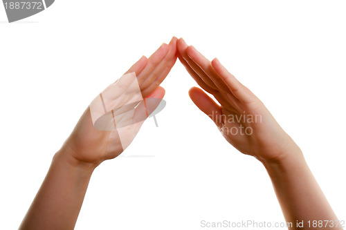 Image of Female hands in the form of the roof