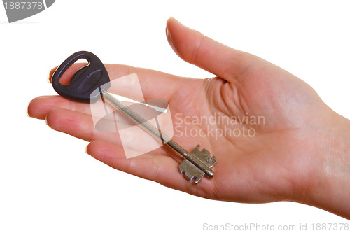 Image of Woman's hand with key on palm