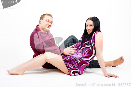 Image of Young couple. A pregnant woman and a man