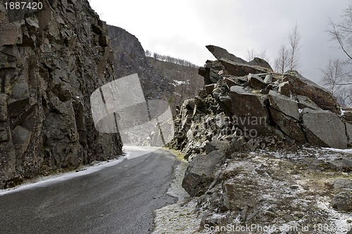 Image of run-down road in rural landscape