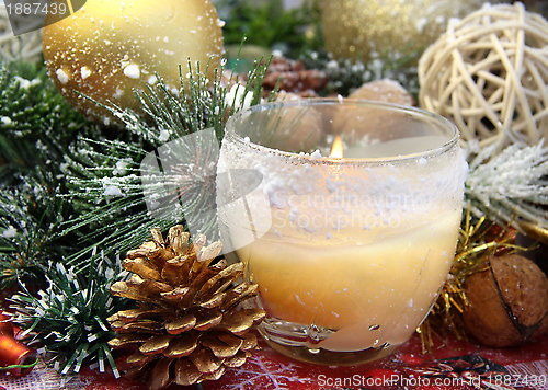 Image of Christmas decorations and candle