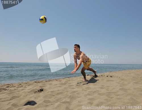 Image of male beach volleyball game player