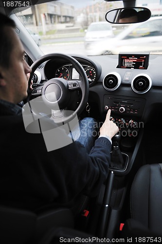 Image of man using car navigation