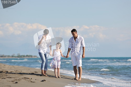 Image of happy young  family have fun on beach