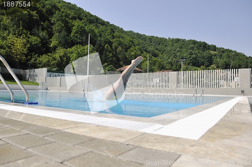 Image of beautiful woman relax on swimming pool