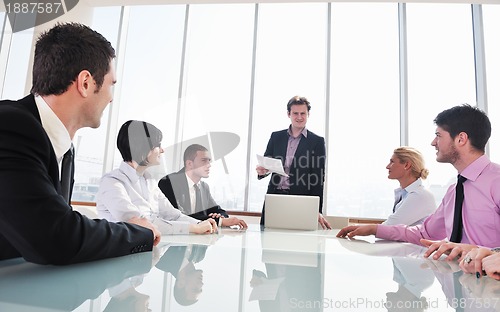 Image of group of business people at meeting