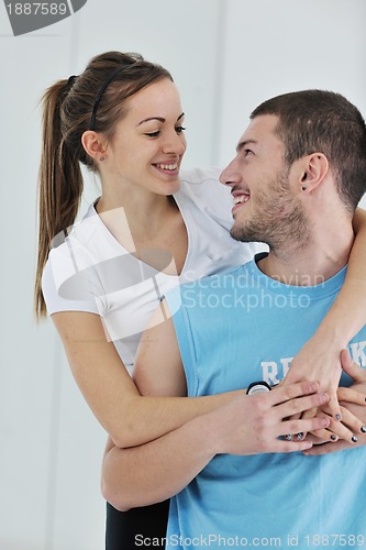 Image of happy young couple fitness workout and fun