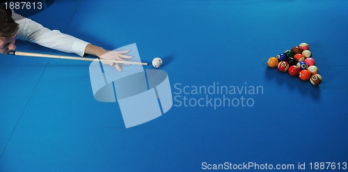 Image of young man play pro billiard game 