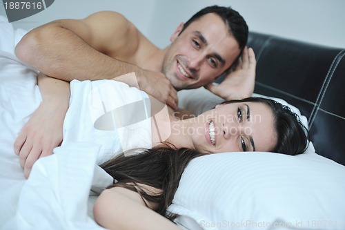 Image of young couple have good time in their bedroom