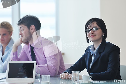 Image of group of business people at meeting