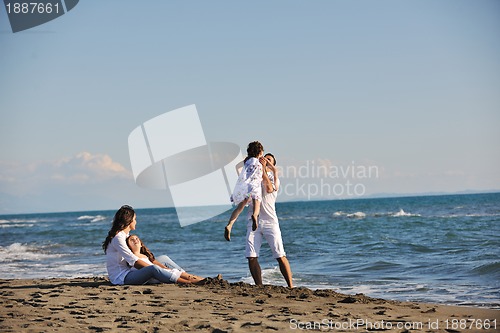 Image of happy young  family have fun on beach