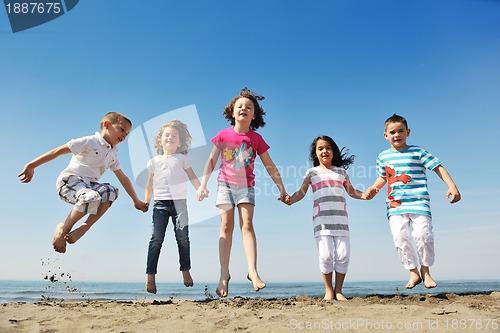Image of happy young  people group have fun on beach