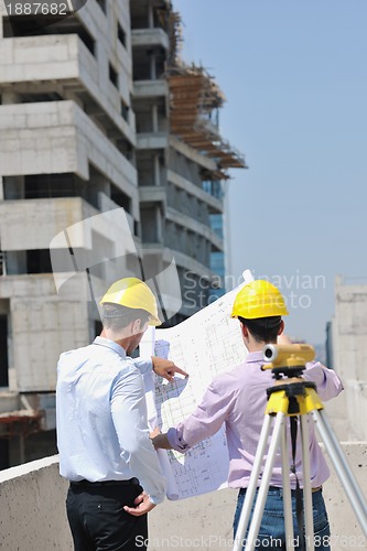 Image of Team of architects on construciton site