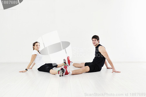 Image of happy young couple fitness workout and fun