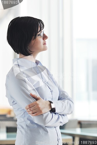 Image of young business woman on meeting