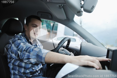 Image of man using car navigation