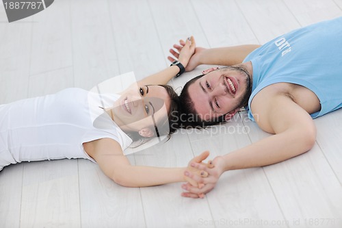 Image of happy young couple fitness workout and fun