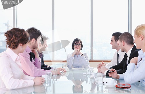 Image of group of business people at meeting