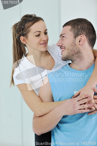 Image of happy young couple fitness workout and fun