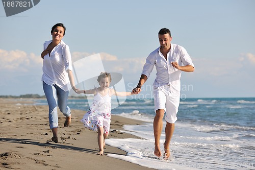 Image of happy young  family have fun on beach