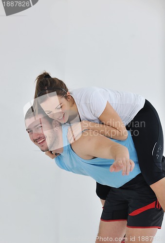 Image of happy young couple fitness workout and fun