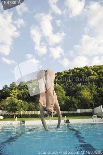 Image of woman relax on swimming pool