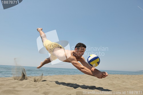 Image of male beach volleyball game player