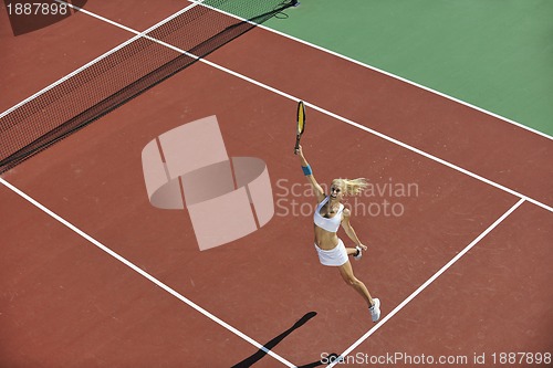 Image of young woman play tennis 